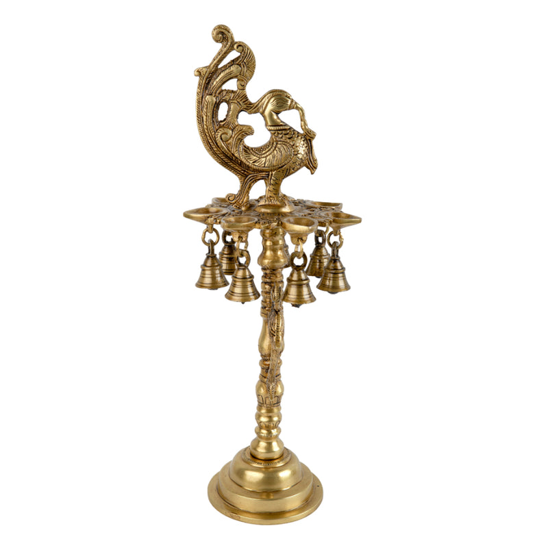 Brass peacock parrot Diya - exquisitely crafted brass oil lamp in the shape of a peacock with parrot motifs, golden finish, decorative home accent, fusion of elegance and vibrancy, traditional Indian Diya, emits a captivating and auspicious glow, perfect for festive occasions and religious ceremonies, enhances spiritual ambiance and decor with a touch of artistic brilliance.