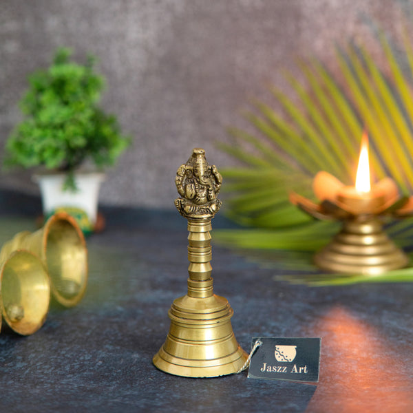 Brass Pooja Bells - meticulously designed brass bells for religious ceremonies, golden finish, decorative home accent, emits a melodious and auspicious sound, perfect for enhancing the sacred atmosphere during pooja (worship), ideal for rituals, prayers, and spiritual practices, symbolizes devotion and divine connection, enhances the ambiance with positive vibrations and spiritual energy, a traditional and essential addition to your collection of brass artifacts for pooja rituals.