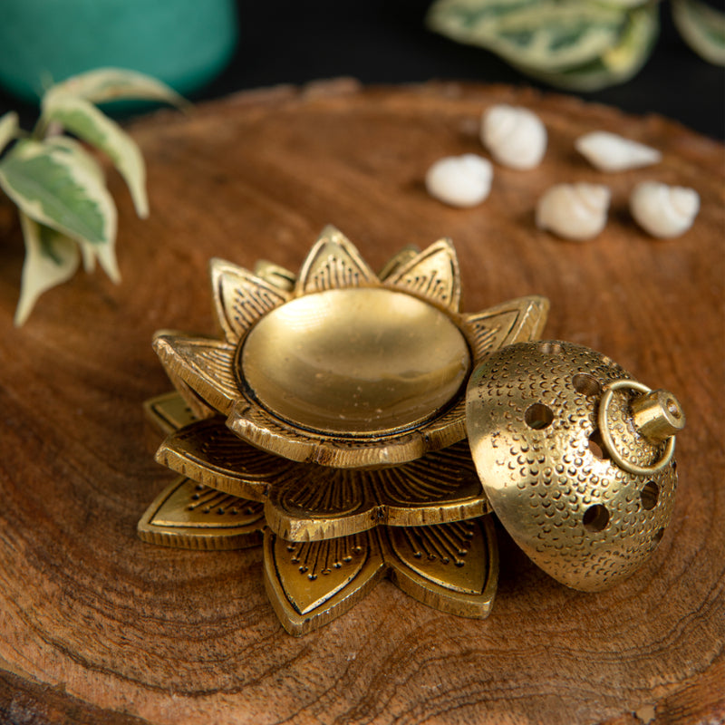 Brass Dhoop Dani - elegantly designed brass incense holder, ideal for burning incense cones or dhoop, golden finish, perfect for home rituals and meditation spaces, enhances the ambiance and fragrance during spiritual practices, symbolizes purification and spiritual elevation, a beautiful and practical addition to your collection of brass incense holders and spiritual accessories.