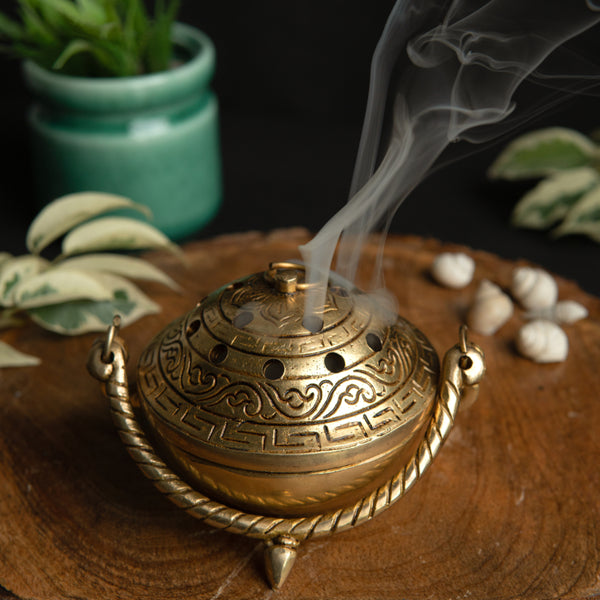 Brass Dhoop Dani - elegantly designed brass incense holder, ideal for burning incense cones or dhoop, golden finish, perfect for home rituals and meditation spaces, enhances the ambiance and fragrance during spiritual practices, symbolizes purification and spiritual elevation, a beautiful and practical addition to your collection of brass incense holders and spiritual accessories.