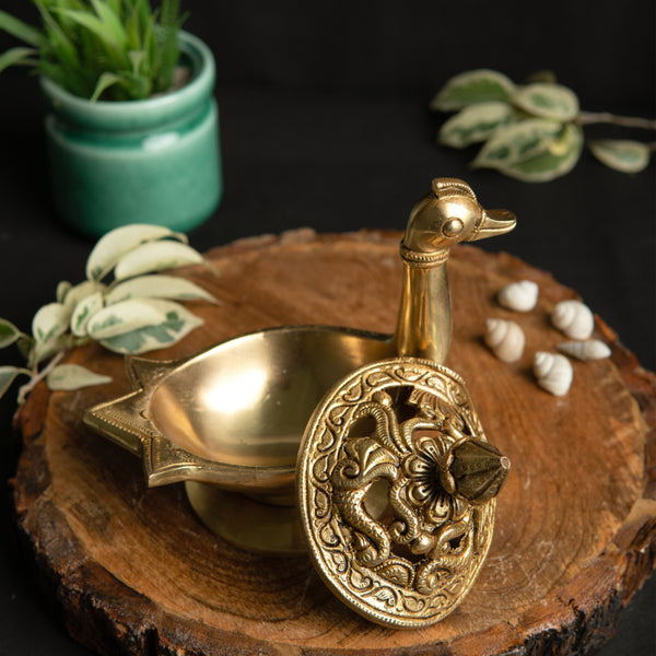 Brass Dhoop Dani - elegantly designed brass incense holder, ideal for burning incense cones or dhoop, golden finish, perfect for home rituals and meditation spaces, enhances the ambiance and fragrance during spiritual practices, symbolizes purification and spiritual elevation, a beautiful and practical addition to your collection of brass incense holders and spiritual accessories.