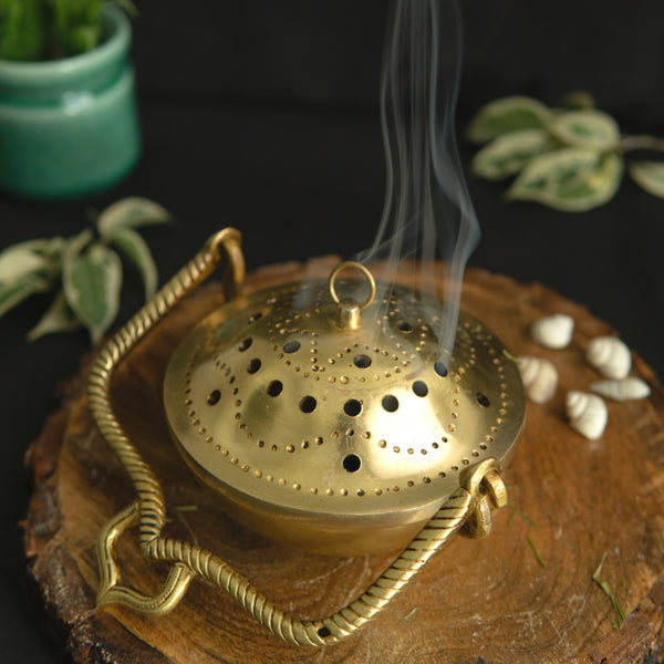 Brass Dhoop Dani - elegantly designed brass incense holder, ideal for burning incense cones or dhoop, golden finish, perfect for home rituals and meditation spaces, enhances the ambiance and fragrance during spiritual practices, symbolizes purification and spiritual elevation, a beautiful and practical addition to your collection of brass incense holders and spiritual accessories.