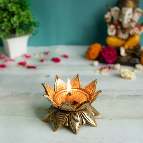 Brass small Akhand Diya - intricately designed brass oil lamp, compact size, traditional Indian Diya, golden finish, decorative home accent, emits a warm and serene glow, ideal for religious ceremonies and meditation, enhances spiritual ambiance and decor.