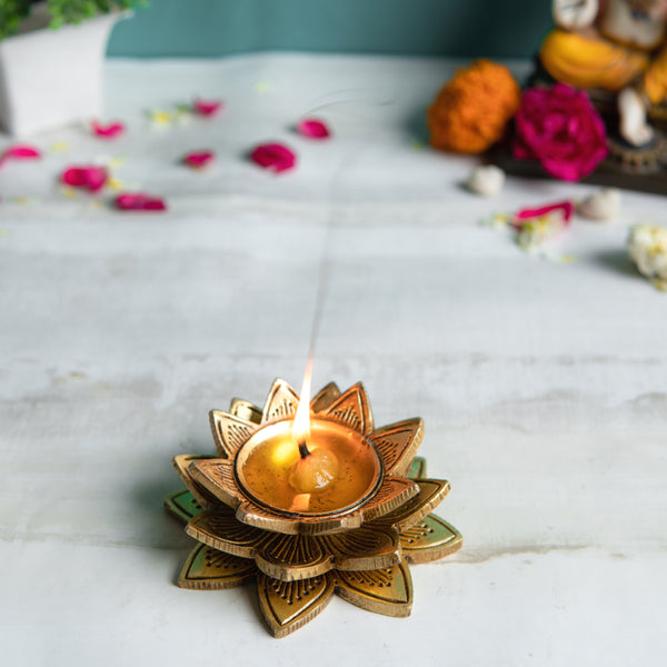 Brass small Akhand Diya - intricately designed brass oil lamp, compact size, traditional Indian Diya, golden finish, decorative home accent, emits a warm and serene glow, ideal for religious ceremonies and meditation, enhances spiritual ambiance and decor.