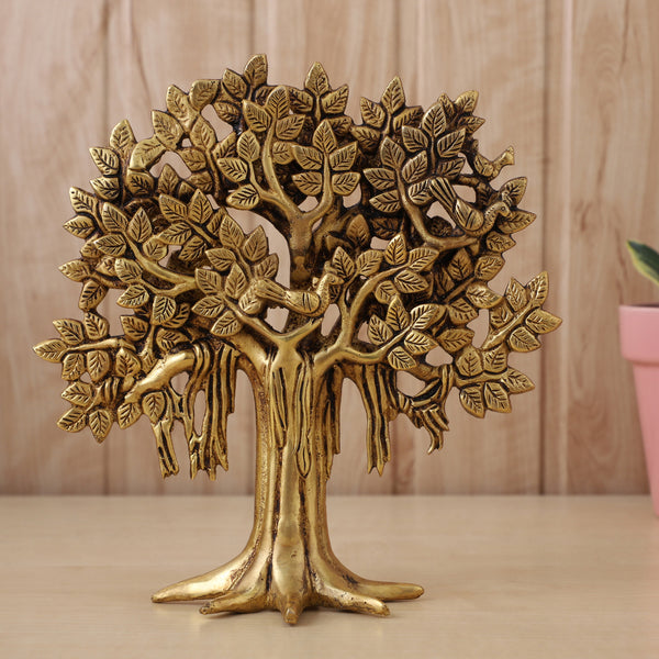 Brass Tree - intricately crafted brass tree sculpture, golden finish, represents strength, growth, and connection to nature, adds a natural and organic element to your home decor, symbolizes stability and grounding, a beautiful centerpiece or accent piece for any room, available in various sizes and designs, a timeless and versatile addition to your collection of brass sculptures and figurines, perfect for nature enthusiasts and those seeking a serene and harmonious atmosphere.