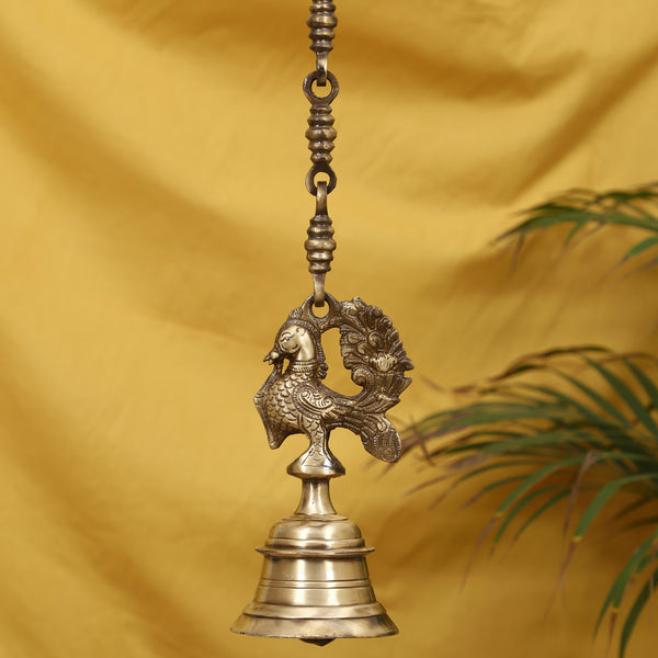 Brass Peacock Bells - beautifully crafted brass bells in the shape of peacocks, traditional design, golden finish, decorative home accent, emits a melodious and enchanting sound, perfect for adding a touch of charm and serenity to any space, ideal for meditation, rituals, and decor, a symbol of beauty and grace, enhances the ambiance and brings positive energy, a delightful addition to your collection of brass artifacts.