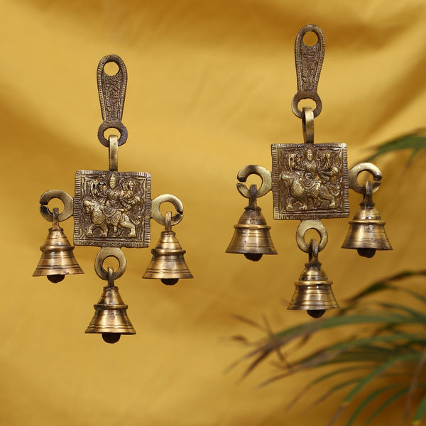 Brass Shera Vali Maa Bells - intricately designed brass bells featuring the Goddess Shera Vali Maa, golden finish, decorative home accent, emits a resonant and divine sound, perfect for invoking the blessings and protection of the goddess, ideal for worship, rituals, and spiritual practices, symbolizes courage, strength, and victory, enhances the ambiance with positive vibrations and divine energy, a sacred and empowering addition to your collection of brass artifacts.