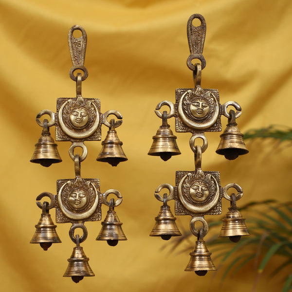 Brass Sun Moon Bells - intricately designed brass bells depicting the sun and moon motifs, golden finish, decorative home accent, emits a gentle and soothing sound, perfect for creating a celestial and serene ambiance, ideal for meditation, yoga, and relaxation, symbolizes the harmonious union of cosmic forces, enhances the atmosphere with positive vibrations and celestial energy, a unique and captivating addition to your collection of brass artifacts.