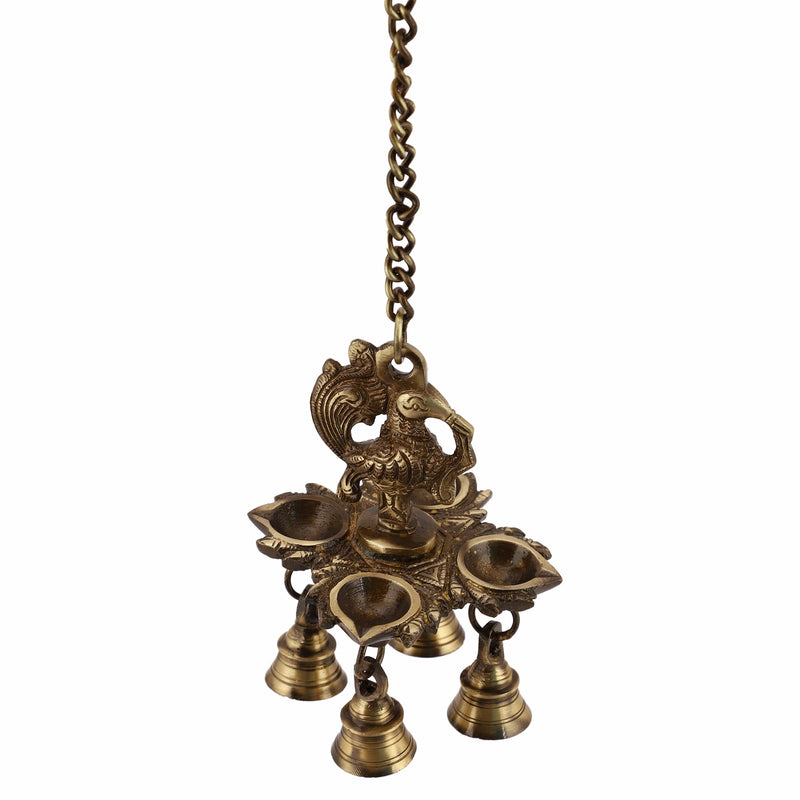 Brass peacock parrot Diya - exquisitely crafted brass oil lamp in the shape of a peacock with parrot motifs, golden finish, decorative home accent, fusion of elegance and vibrancy, traditional Indian Diya, emits a captivating and auspicious glow, perfect for festive occasions and religious ceremonies, enhances spiritual ambiance and decor with a touch of artistic brilliance.