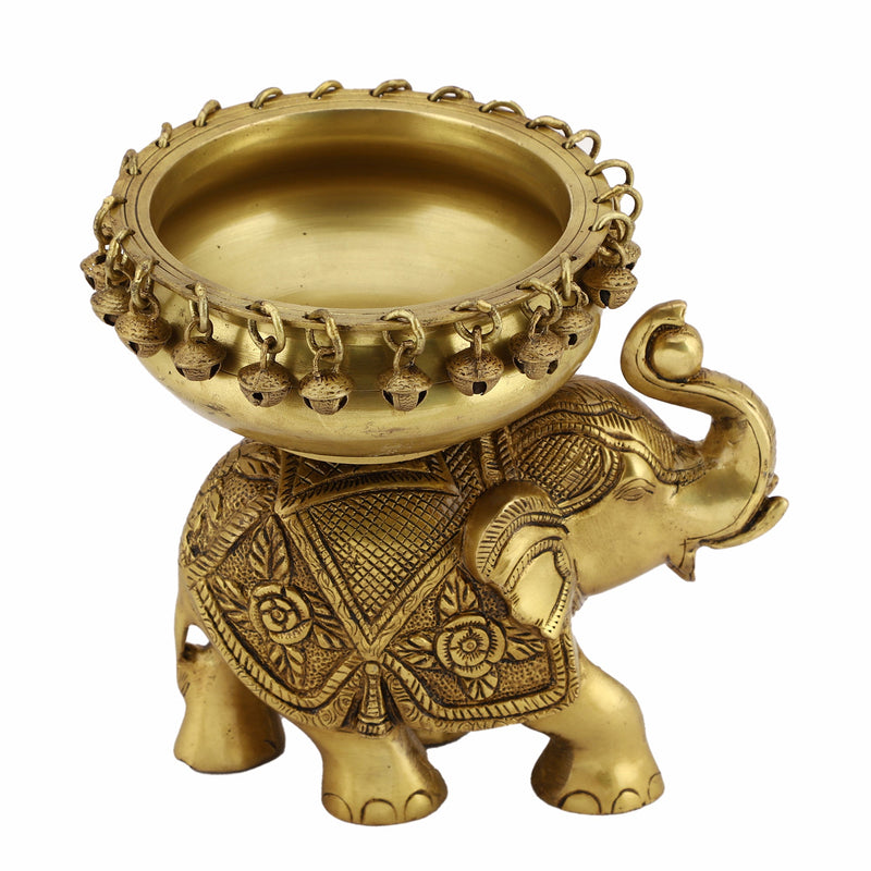 Brass Elephant Urli - meticulously designed brass decorative bowl featuring elephant motifs, golden finish, traditional Indian Urli, versatile home accent, ideal for floating flower petals or candles, symbolizes strength and wisdom, adds a touch of cultural charm and serenity to any space, perfect for creating an inviting ambiance and enhancing interior decor, a timeless piece of art for both indoor and outdoor settings.