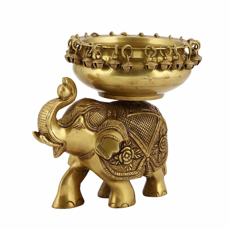 Brass Elephant Urli - meticulously designed brass decorative bowl featuring elephant motifs, golden finish, traditional Indian Urli, versatile home accent, ideal for floating flower petals or candles, symbolizes strength and wisdom, adds a touch of cultural charm and serenity to any space, perfect for creating an inviting ambiance and enhancing interior decor, a timeless piece of art for both indoor and outdoor settings.