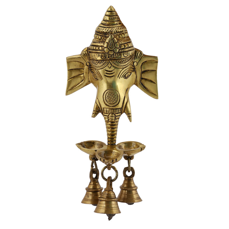 Brass Wall Diya - intricately designed brass oil lamp for wall mounting, golden finish, decorative home accent, traditional Indian Diya, emits a warm and inviting glow, ideal for enhancing wall decor and creating an ambiance of serenity, perfect for religious ceremonies and festive occasions, adds a touch of traditional charm to interior spaces.