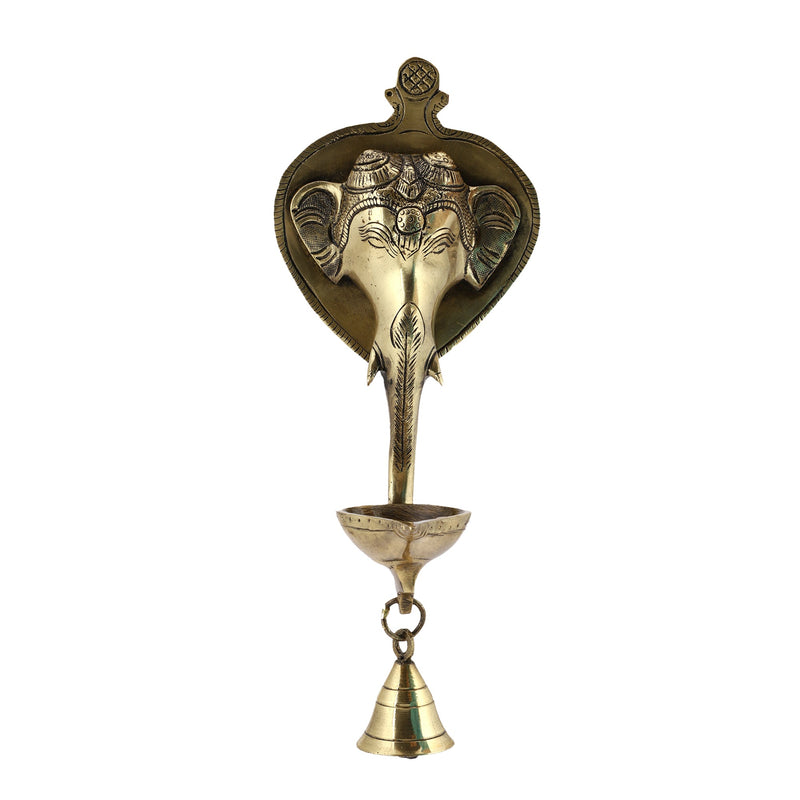 Brass Wall Diya - intricately designed brass oil lamp for wall mounting, golden finish, decorative home accent, traditional Indian Diya, emits a warm and inviting glow, ideal for enhancing wall decor and creating an ambiance of serenity, perfect for religious ceremonies and festive occasions, adds a touch of traditional charm to interior spaces.