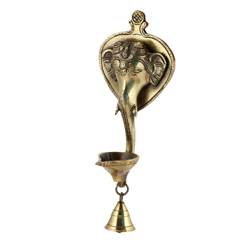 Brass Wall Diya - intricately designed brass oil lamp for wall mounting, golden finish, decorative home accent, traditional Indian Diya, emits a warm and inviting glow, ideal for enhancing wall decor and creating an ambiance of serenity, perfect for religious ceremonies and festive occasions, adds a touch of traditional charm to interior spaces.