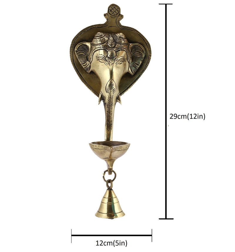 Brass Wall Diya - intricately designed brass oil lamp for wall mounting, golden finish, decorative home accent, traditional Indian Diya, emits a warm and inviting glow, ideal for enhancing wall decor and creating an ambiance of serenity, perfect for religious ceremonies and festive occasions, adds a touch of traditional charm to interior spaces.