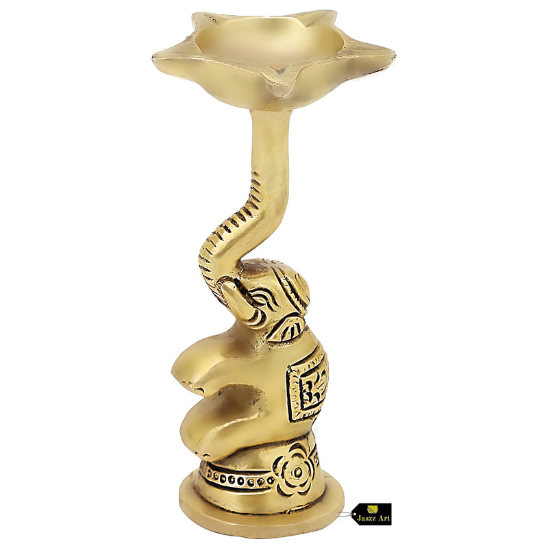  Brass Elephant Diya - intricately designed brass oil lamp in the shape of an elephant, golden finish, decorative home accent, symbolizes strength and wisdom, traditional Indian Diya, emits a warm and enchanting glow, ideal for religious ceremonies and festive occasions, enhances spiritual ambiance and decor