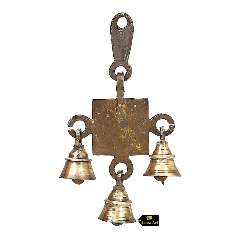 Brass OM Bells - intricately designed brass bells in the shape of the sacred Om symbol, golden finish, decorative home accent, emits a soothing and resonant sound, perfect for creating a calming and spiritual ambiance, ideal for meditation, yoga, and spiritual practices, symbolizes unity and divine energy, enhances the atmosphere with positive vibrations, a meaningful addition to your collection of brass artifacts
