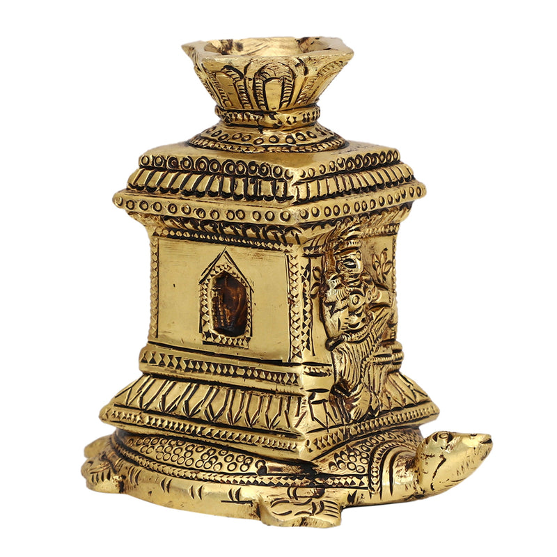 Brass small Akhand Turtle Diya - intricately designed brass oil lamp, compact size, traditional Indian Diya, golden finish, decorative home accent, emits a warm and serene glow, ideal for religious ceremonies and meditation, enhances spiritual ambiance and decor.