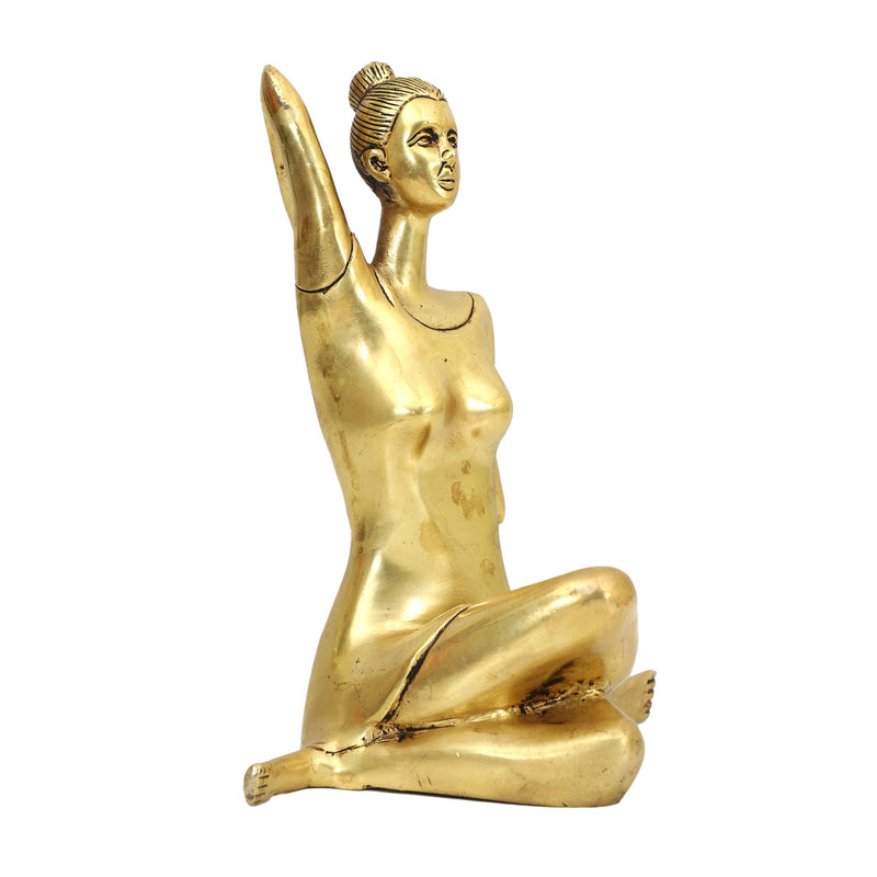 Brass Yoga Lady - beautifully sculpted brass statue of a female yogi in a yoga pose, golden finish, represents strength, balance, and mindfulness, perfect for yoga enthusiasts and spiritual practitioners, adds a serene and calming element to your home decor, symbolizes the harmony between mind, body, and spirit, a unique and inspiring addition to your collection of brass sculptures and figurines, ideal for yoga studios and meditation spaces.