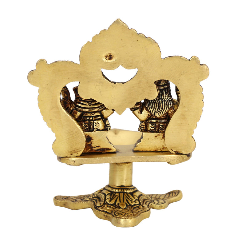 Brass Ganesha Lakshmi Diya - exquisitely crafted brass oil lamp featuring Lord Ganesha and Goddess Lakshmi, golden finish, decorative home accent, symbolizes prosperity and divine blessings, traditional Indian Diya, emits a radiant and auspicious glow, perfect for religious ceremonies and festive occasions, enhances spiritual ambiance and decor with the blessings of Ganesha and Lakshmi.