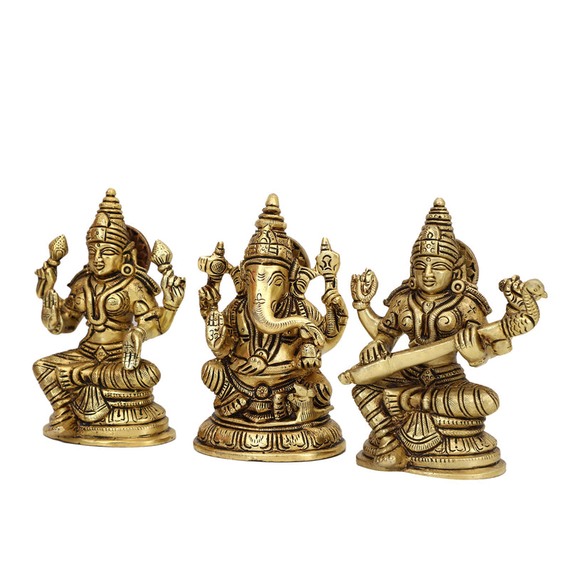 Brass God Lakshmi Ganesh Saraswati Ji - intricately crafted brass statue featuring Lord Lakshmi, Lord Ganesha, and Goddess Saraswati, golden finish, divine and auspicious deities, perfect for home decor and spiritual spaces, ideal for invoking blessings, prosperity, wisdom, and creativity, symbolizes wealth, intellect, and divine grace, enhances the spiritual energy and fosters a sense of divine presence, a sacred and harmonious addition to your collection of brass sculptures and figurines.