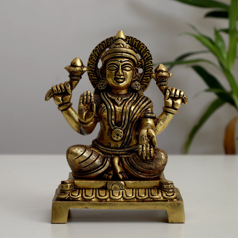 Brass God Lakshmi Ganesha Ji - meticulously designed brass statue featuring Lord Lakshmi and Lord Ganesha, golden finish, auspicious and revered deities, perfect for home decor and spiritual spaces, ideal for invoking blessings, prosperity, and success, symbolizes wealth, wisdom, and divine grace, enhances the spiritual energy and fosters a sense of divine presence, a sacred and blessed addition to your collection of brass sculptures and figurines.