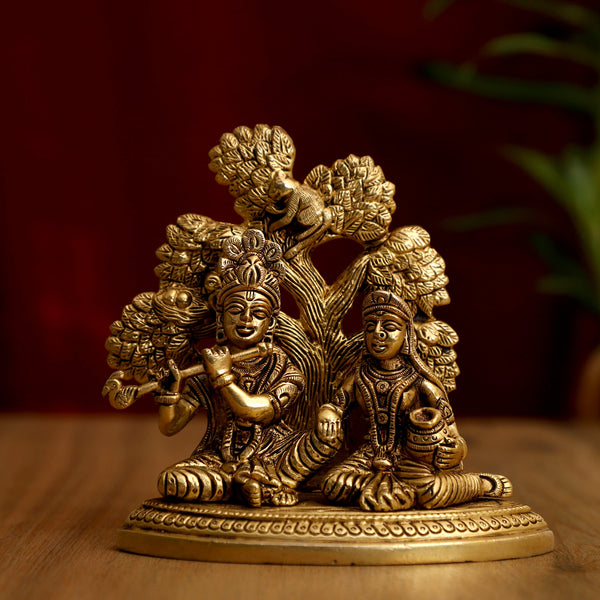 Brass God Radha Krishna Ji - intricately designed brass statue featuring Lord Krishna and Radha, golden finish, divine and eternal divine couple, perfect for home decor and spiritual spaces, ideal for invoking love, devotion, and divine union, symbolizes divine love, harmony, and transcendence, enhances the spiritual energy and fosters a sense of divine presence, a sacred and cherished addition to your collection of brass sculptures and figurines."
