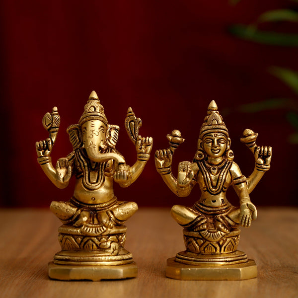 Brass God Lakshmi Ganesha Ji - meticulously designed brass statue featuring Lord Lakshmi and Lord Ganesha, golden finish, auspicious and revered deities, perfect for home decor and spiritual spaces, ideal for invoking blessings, prosperity, and success, symbolizes wealth, wisdom, and divine grace, enhances the spiritual energy and fosters a sense of divine presence, a sacred and blessed addition to your collection of brass sculptures and figurines.