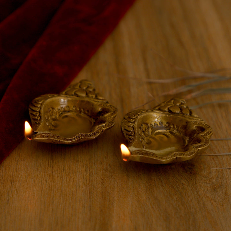 Brass small Akhand Diya - intricately designed brass oil lamp, compact size, traditional Indian Diya, golden finish, decorative home accent, emits a warm and serene glow, ideal for religious ceremonies and meditation, enhances spiritual ambiance and decor.