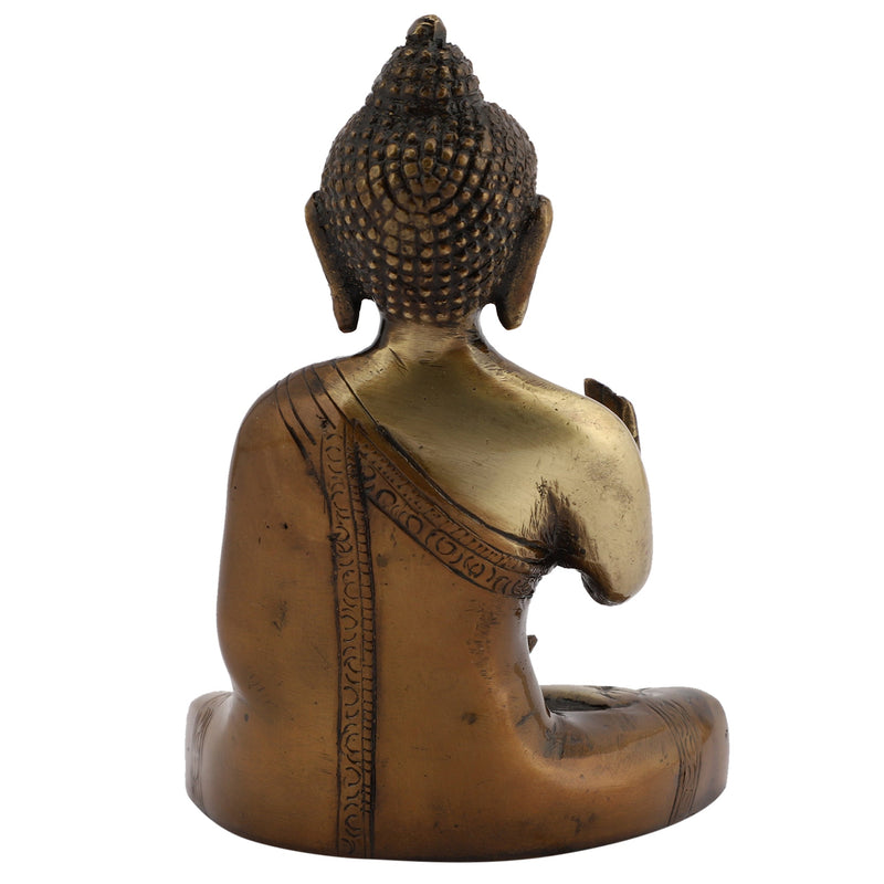 Brass God Gautam Buddha - finely crafted brass statue of Gautam Buddha, golden finish, serene and meditative expression, perfect for home decor and spiritual spaces, ideal for creating a calming and peaceful ambiance, symbolizes enlightenment, compassion, and inner peace, enhances the spiritual energy and fosters a sense of tranquility, a sacred and inspiring addition to your collection of brass sculptures and figurines.