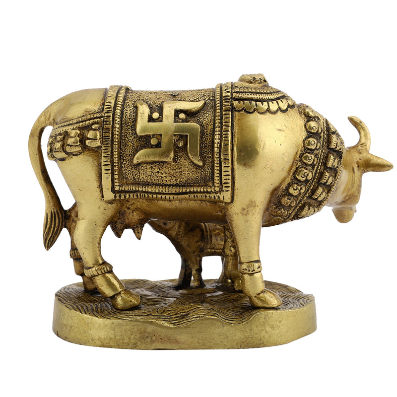 Brass God Kamdhenu Cow - finely crafted brass statue of Kamdhenu, the divine wish-fulfilling cow, golden finish, auspicious and revered deity, perfect for home decor and spiritual spaces, ideal for invoking blessings and abundance, symbolizes prosperity, fertility, and divine blessings, enhances the spiritual energy and fosters a sense of divine presence, a sacred and cherished addition to your collection of brass sculptures and figurines.