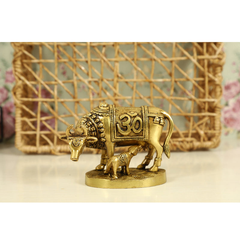 Brass God Kamdhenu Cow - finely crafted brass statue of Kamdhenu, the divine wish-fulfilling cow, golden finish, auspicious and revered deity, perfect for home decor and spiritual spaces, ideal for invoking blessings and abundance, symbolizes prosperity, fertility, and divine blessings, enhances the spiritual energy and fosters a sense of divine presence, a sacred and cherished addition to your collection of brass sculptures and figurines.