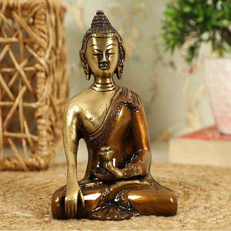 Brass God Gautam Buddha - finely crafted brass statue of Gautam Buddha, golden finish, serene and meditative expression, perfect for home decor and spiritual spaces, ideal for creating a calming and peaceful ambiance, symbolizes enlightenment, compassion, and inner peace, enhances the spiritual energy and fosters a sense of tranquility, a sacred and inspiring addition to your collection of brass sculptures and figurines.