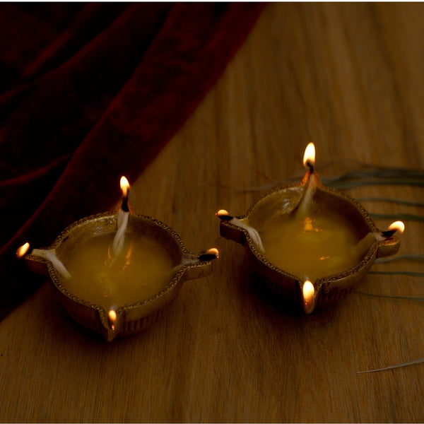 Brass small Akhand Diya - intricately designed brass oil lamp, compact size, traditional Indian Diya, golden finish, decorative home accent, emits a warm and serene glow, ideal for religious ceremonies and meditation, enhances spiritual ambiance and decor.